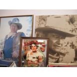 Tuborg Wall Mirror, 50 x 40cm; two John Wayne prints. (3)