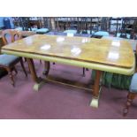 Art Deco Walnut Dining Table, having draw leaves on lyre supports, gilt painted base.