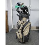 Lady Hogan, Hippo Plus Drivers and Other Golf Clubs, in a Green Lamb golf bag.