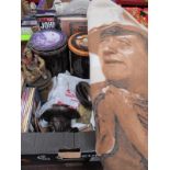 John Wayne Memorabilia, to include bronzed wall mask, plates, belt, rug, tins, books:- One Box