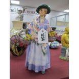 Royal Doulton Figurine 'Romany Sue' HN 1758, in lavender dress and floral shawl.