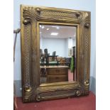 Rectangular Bevelled Wall Mirror, in gilt scroll and lattice frame, 123cm wide.