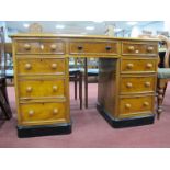 XIX Century Mahogany Twin Pedestal Desk, with turned handles to nine drawers, on stained plinth