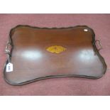 An Edwardian Mahogany Twin Handled Tray, with wavy edge and inlaid shell detail to the centre,