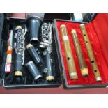 Armstrong Five Piece Clarinet, three piece flute, both cased. (2)