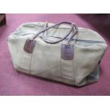 A Vintage Leather Handled Canvas Travel Holdall Bag, base 60cm wide.