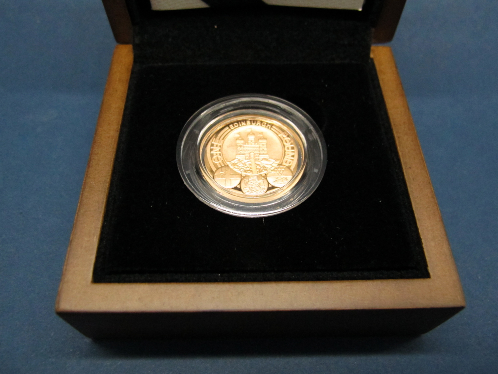 The Royal Mint 2011 UK Edinburgh One Pound Gold Proof Coin, certified No.0219, cased.