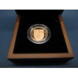 The Royal Mint 2009 UK Shield of The Royal Arms One Pound Gold Proof Coin, certified No.0587,
