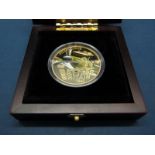 A Westminster Issue Guernsey 2010 22 Carat Gold Five Pounds Crown '70th Anniversary Battle of