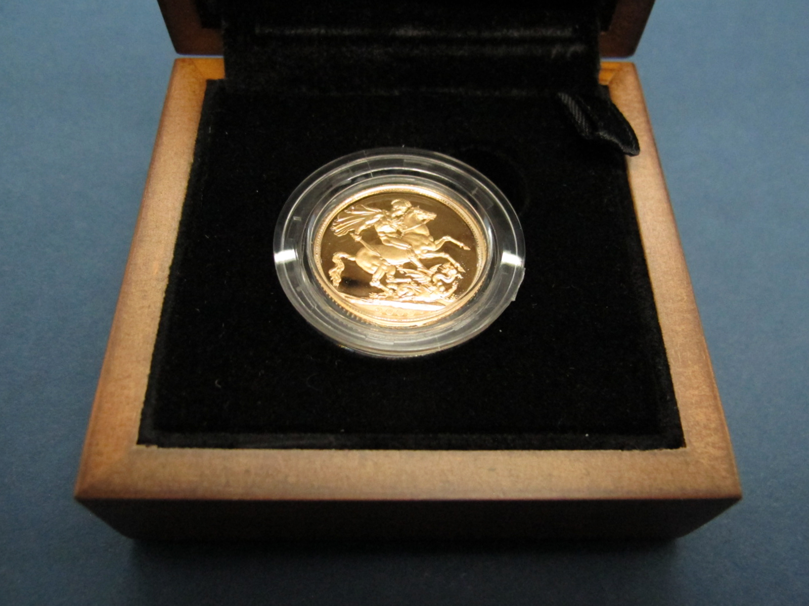 The Royal Mint 2009 UK Gold Proof Sovereign, certified No.117, cased.