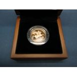 The Royal Mint 2011 UK Gold Proof Sovereign, certified No.2574, cased.