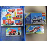 Four Lego Sets, to include #6450 Legoland light and sound mobile Police truck, Lego #544 universal