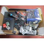 Original Sony Playstatin and Playstation 2 Gaming Consoles, four control pads, a boxed Williams F1