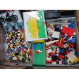 A Quantity of Loose Lego Components, including Lego People, battery blocks.