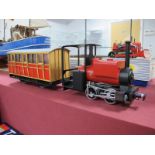 A Modern 'O' Gauge 'Narrow' Gauge 0-4-0 Locomotive and Coach, wooden construction in the style of