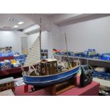 A Kit/Scratch Built Model of a Small Fishing Boat, radio controlled and battery operated,