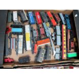 Over Twenty "OO" Scale Model Railway Wagons and Coaches, by Hornby and others, all playworn.