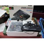 A Boxed Sega Mega Drive 16 Bit Gaming Console, S/No A10421265, including one control pad,