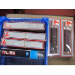 Six Lima "OO" Gauge Eight Wheeled Parcel Vans, including #305371W LMS, all boxed.