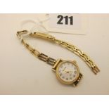 A 9ct Gold Cased Ladies Wristwatch, to a geometric link bracelet with 9ct gold clasp (damages)