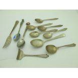 A Set of Five Hallmarked Silver Teaspoons; a matching hallmarked silver child's spoon and fork,