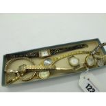 A 9ct Gold Cased Ladies Wristwatch, to integral bracelet; together with futther ladies wristwatches,