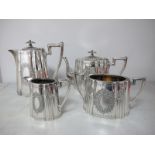 An Electroplated Four Piece Tea Set, each of fluted tapering oval form, with vacant oval