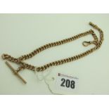 A 9ct Rose Gold Curb Link Double Albert Chain, to 9ct gold double swivel style clasp, suspending T-