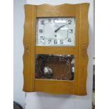 FBS Lighwood Cased Wall Clock, circa mid XX Century having silvered dial, and mirrored pendulum.