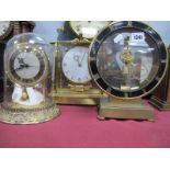 Hettich Clock, under glass dome, Kundo brass circular cased mantle clock by Kieninger and Obergfell,