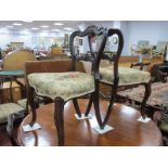 A Set of Six XIX Century Mahogany/Rosewood Dining Chairs, each having shaped balloon back, carved