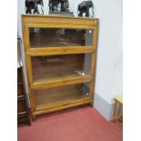 Gunn, Oak Three Sectional Bookcase in the Globe Wernicke Manner, with glazed doors on low base.