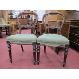 A Pair of XIX Century Mahogany Balloon Back Dining Chairs, each with carved bar to back on turned