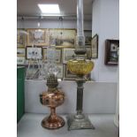 Copper Oil Lamp, French white metal Corinthian column example having amber glass well. (2)