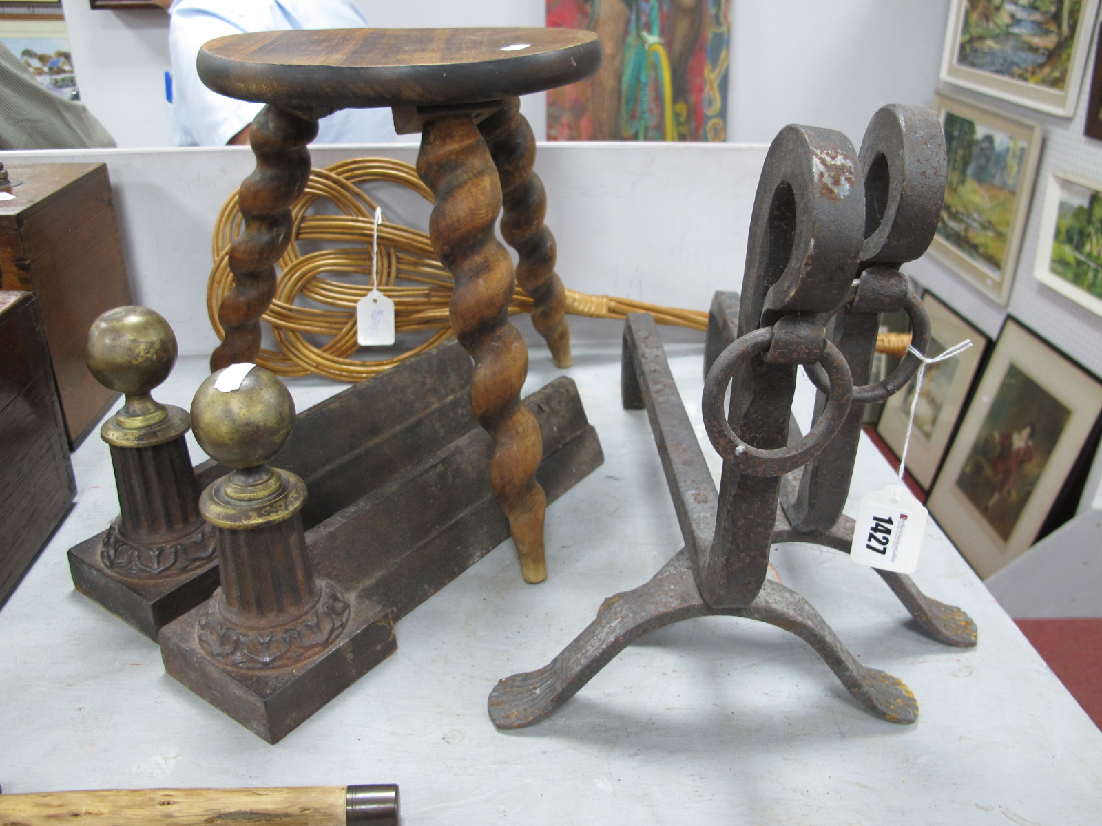 Two Pairs of Iron Fire Dogs, barley twist legged stool, carpet beater.