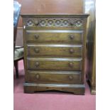 Oak Chest of Five Drawers, the upper having wheel carving, the corners chamfered, 69.5cm wide.