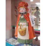 A Mid XX Century Porcelain Figure of Little Red Riding Hood, 15cm high.