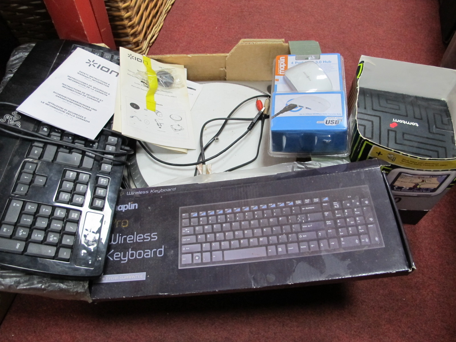 Ion USB Turntable, three keyboards and a Tomtom GO 300 satellite navigation system - untested sold