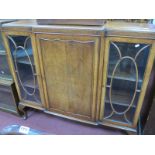 A 1920's Walnut Breakfront Display Cabinet, having end glazed doors on squat cabriole legs 122cm