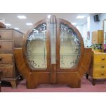 Art Deco Walnut Display Cabinet, of circular form with protruding lower lugs, the twin glazed