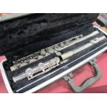 A Bundy Selmer Company Nickel Plated Three Part Flute, presented within a fitted case.