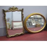 Mirrors; Oval Wall Mirror and another in scroll frame. (2)