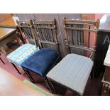 A Set of Three Early XX Century Stained Walnut Bedroom Chairs, having spindle backs and tapering