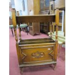 1920's Oak Book Trough, having turned finials, lower magazine compartment featuring Jacobean style