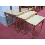 A Nest of Three Gilt Metal Coffee Tables, having onyx insets to top,