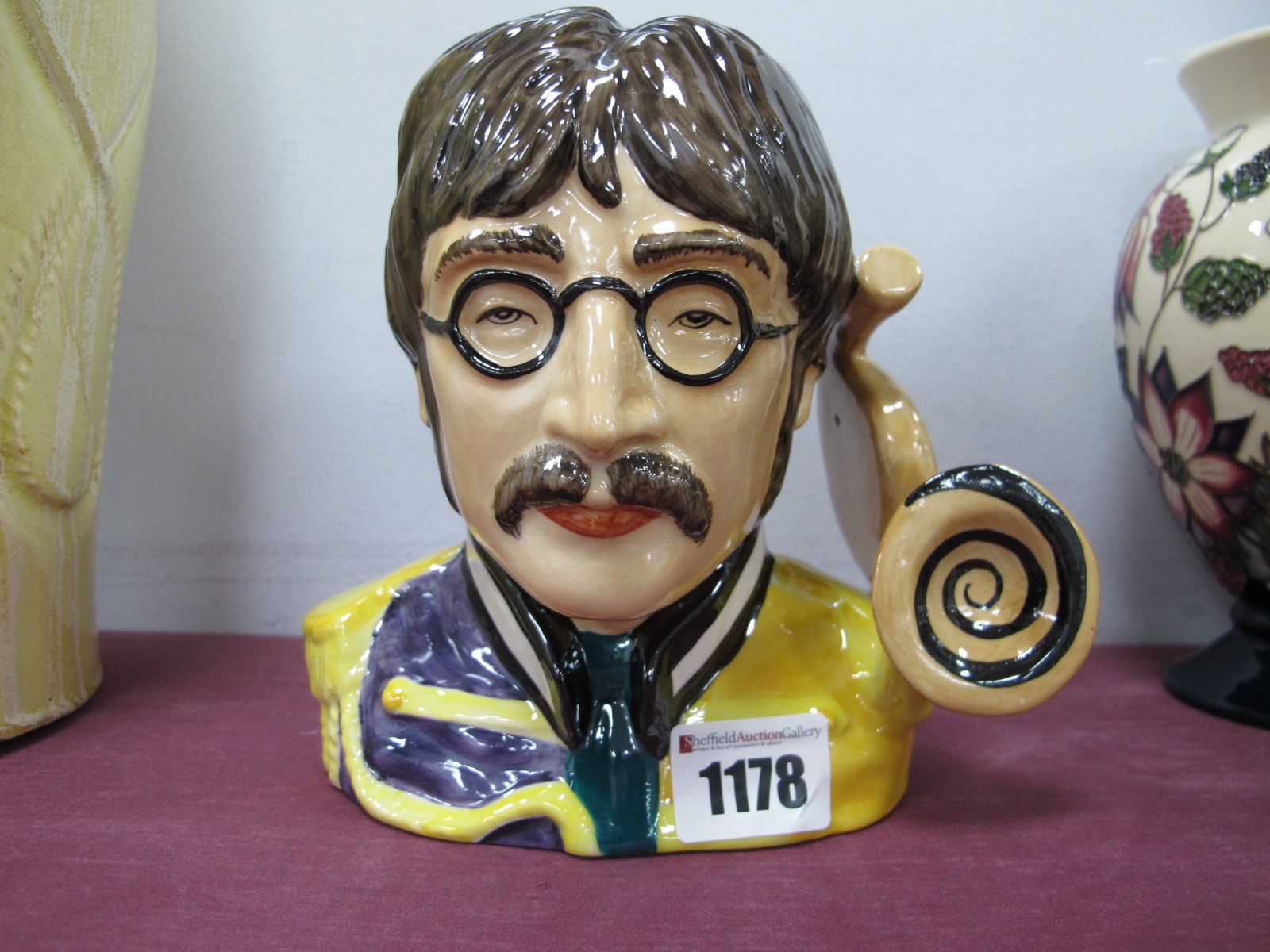 A Peggy Davies Character Jug 'John Lennon, artists proof by Victoria Bourne, 16.5cm high.