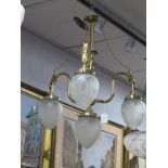 Brass Three Branch Ceiling Light, with acanthus leaf supports to ovoid frosted glass shades.