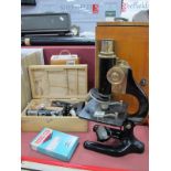 A C. Baker London 9609 Microscope, in case; two Students Microscopes and a box of slides.