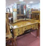 A Queen Anne Style Walnut Dressing Table, circa 1930's, 112cm wide.