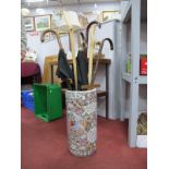 A Quantity of Walking Canes, umbrellas, drawing squares, in pottery stick stand.